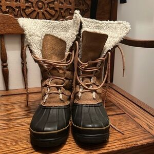 Used, but good condition. Laces are a little worn.